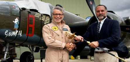 RAF MAF Board Member John T Session receiving a ceremonial sword from Mr Tim Manor for RAF MAF Washington's Dinner.