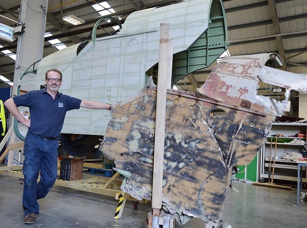 Aircraft Technician Dave Carr with the newly built Hampden forward fuselage next to the original section from P1344 Aircraft Technician Dave Car with the newly built Hampden forward fuselage next to the original section from P1344