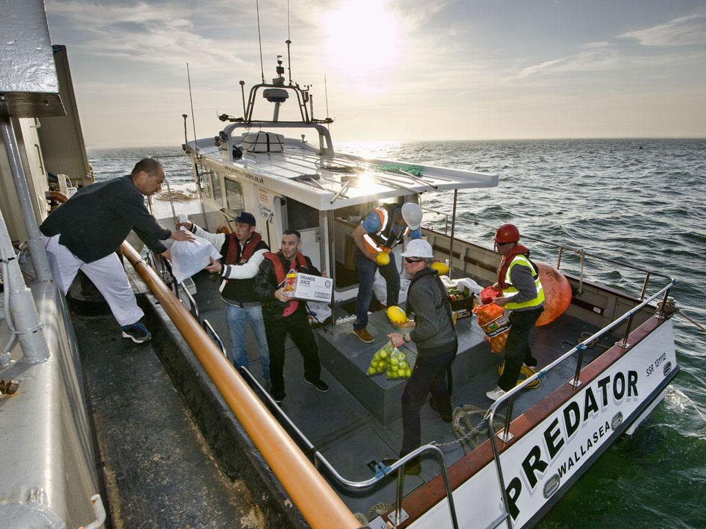 A busy crew is a hungry crew- the Predator is the barge's daily link with land.