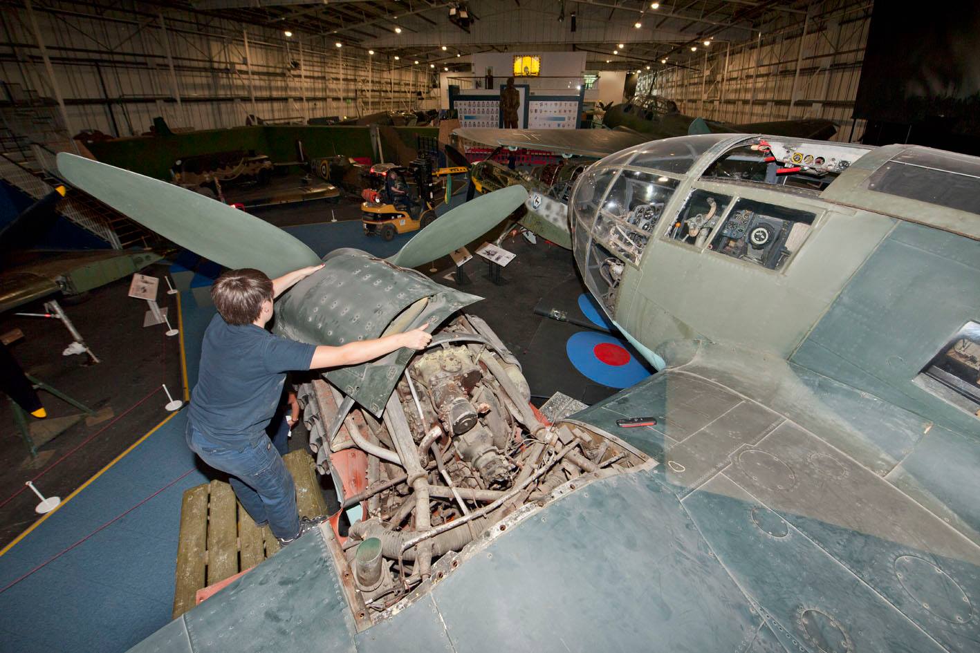 An engine cowling being removed from the Heinkel 111 He-20 An engine cowling being removed from the Heinkel 111 He-20