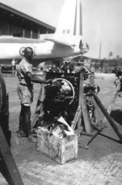Member of the West African Air Corps working on an aero engine, Gambia, circa 1944 (X002-9326) Member of the West African Air Corps working on an aero engine, Gambia, circa 1944 (X002-9326)