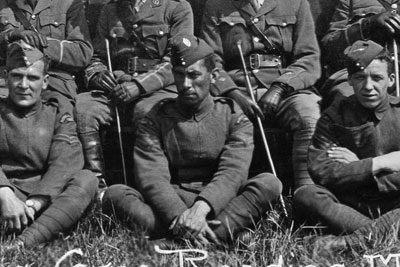 The Staff, School of Technical Training (Men), Royal Flying Corps, Reading, May 1917 (X003-2696) None of the officers or men in the photograph is named. The Black corporal (inset) is probably a ground instructor. The Staff, School of Technical Training (Men), Royal Flying Corps, Reading, May 1917 (X003-2696) None of the officers or men in the photograph is named. The Black corporal (inset) is probably a ground instructor.