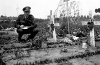 Flight Lieutenant Noel Archer of the MRES noting details of aircrew graves