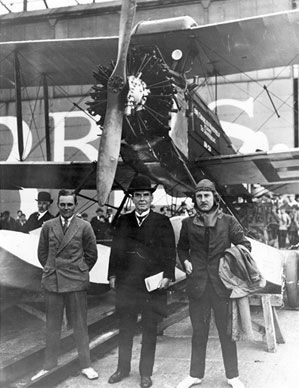 (From left to right) Arthur Elliott, Sir Charles Wakefield and Alan Cobham in front of a de Havilland D.H.50J biplane with specially constructed floats at Rochester, England (From left to right) Arthur Elliott, Sir Charles Wakefield and Alan Cobham in front of a de Havilland D.H.50J biplane with specially constructed floats at Rochester, England